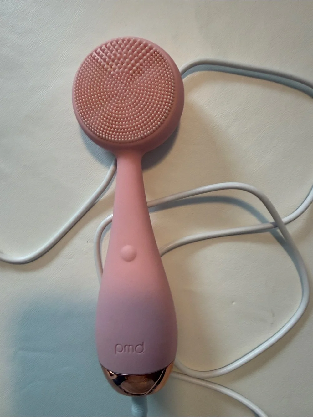 PMD Pink Facial Massager with Rose Gold Accent and White Cable